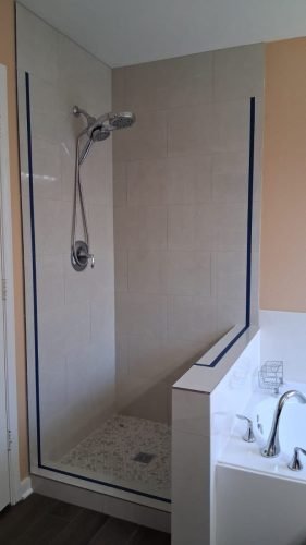Frameless Shower Door with Knee-Wall Glass Panel — Houston TX