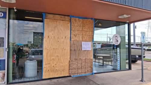 BEFORE: Restaurant Storefront Glass Damage, Plywood Cover — Houston TX