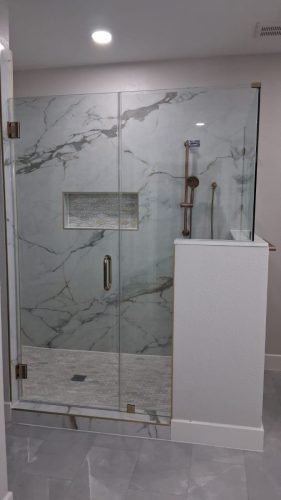 AFTER: Frameless Shower Door and Panel, Marble Tile, Black Hardware — Houston TX